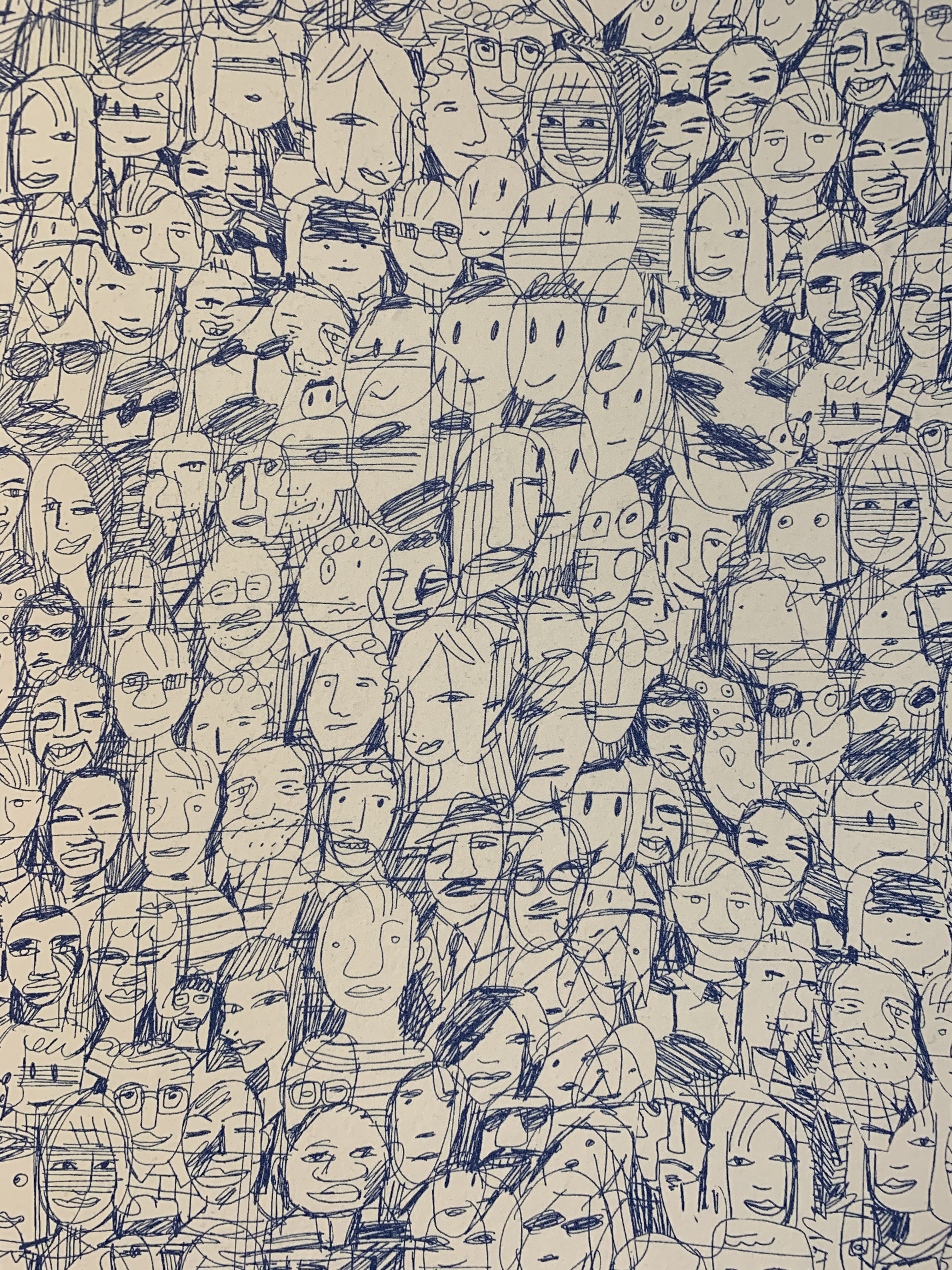 sketch of human faces drawn in ink